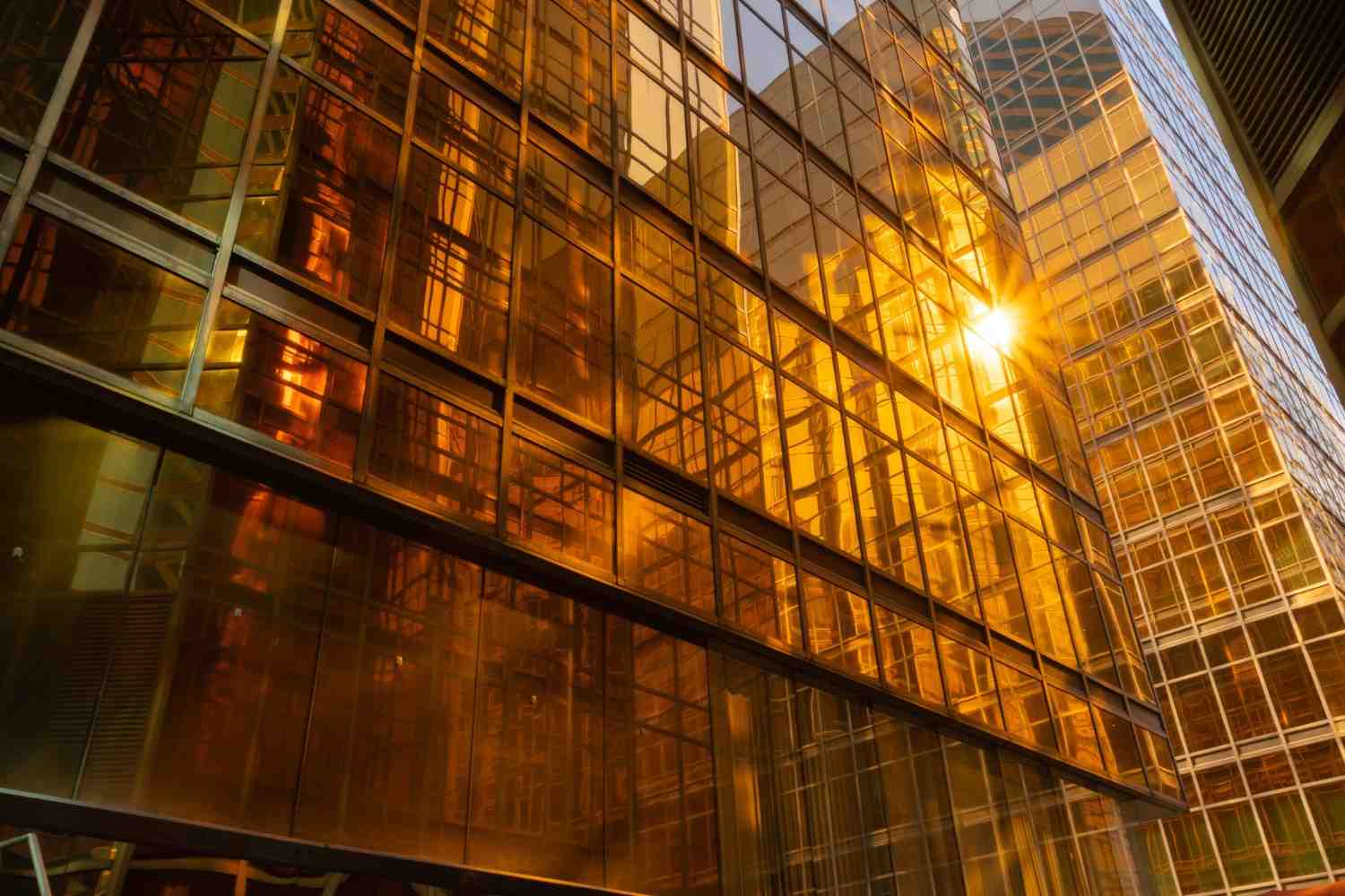 Office buildings windows. Glass architecture facade design with reflection